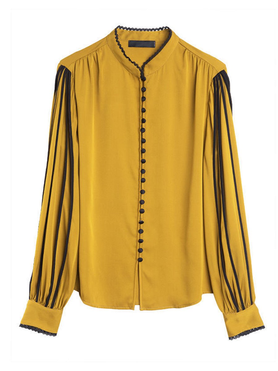 Elegant Blouse with Black Trim Accents Elegant Blouse with Black Trim Accents