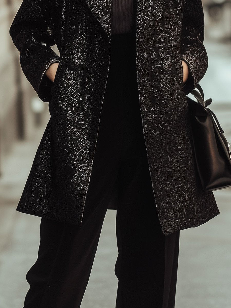 Elegant Black Textured Blazer with Subtle Paisley Motifs Elegant Black Textured Blazer with Subtle Paisley Motifs